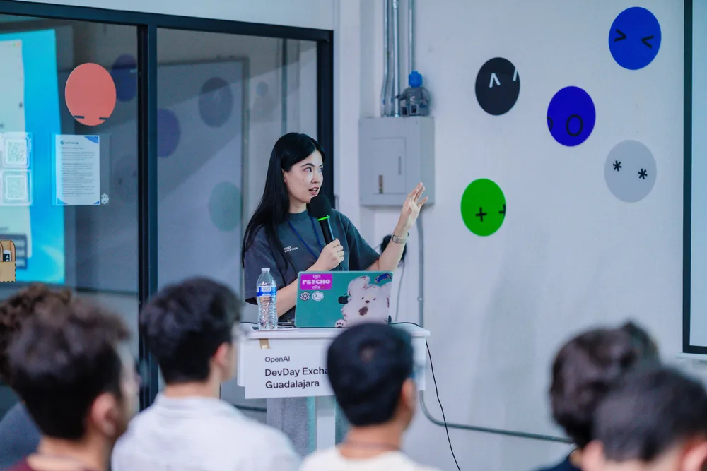A speaker addressing attendees at DevDay Exchange in Guadalajara