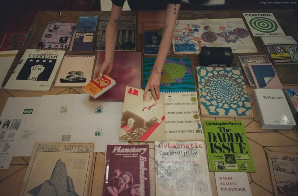 Photograph of books on a table used in Rohan Nuttall's interactive Astra demo.